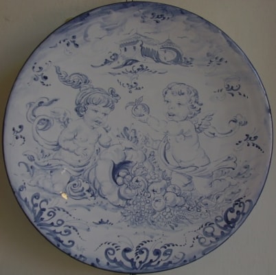 Artistic italian pottery of Albisola - Plate decorated with mythological scene " Angels with horn of pently  " in " antico Savona " 